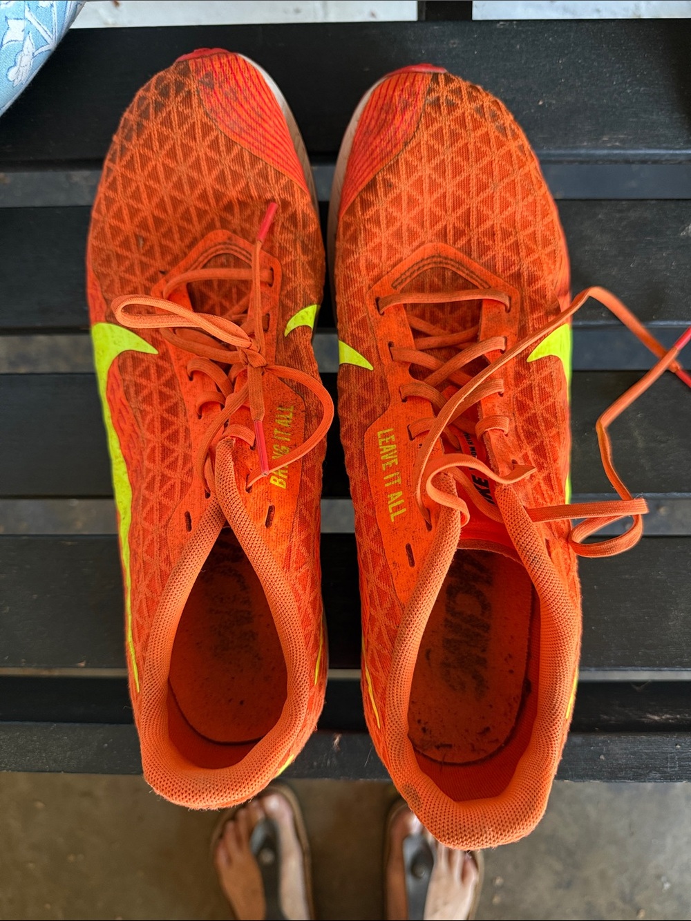 Nike Bright Orange Running Shoes with Neon Yellow Swoosh and spikes